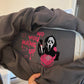 Dark hoodie with a halloween embroidered design